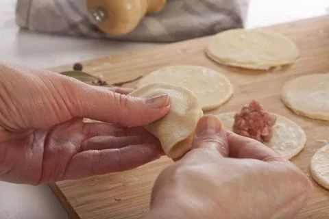 Making dumplings Stock Photos