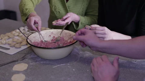 Making dumplings at the table Stock Footage 59315320