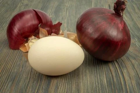 Making Easter eggs dyed with onion skins concept Stock Photos