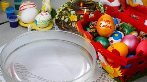 Making easter eggs with thermo envelope in a hot water Stock Footage 87856995