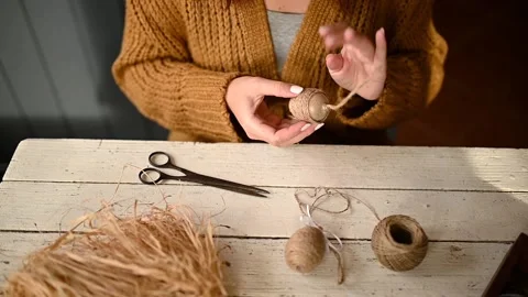 Making eeaster egg with rope Stock Footage 142290745