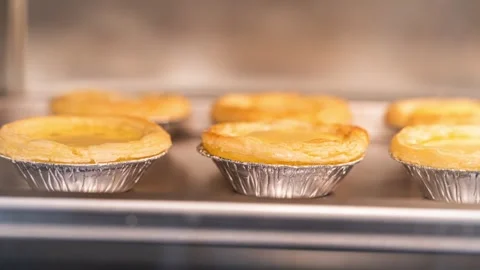 Making Egg Tarts in the Oven Stock Footage 330280556