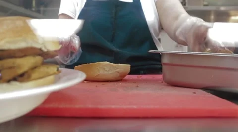 Making an Eggplant Parmesan Sandwich Stock Footage 42710899