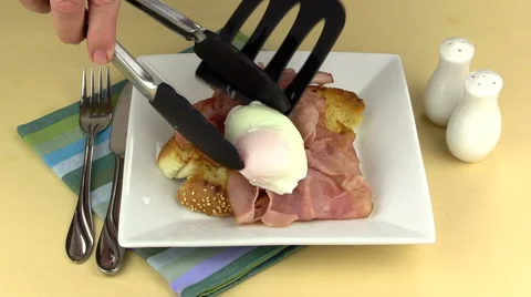 Making Eggs Benedict With Ham Stock Footage 63135146