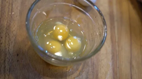 Making eggs, cooking eggs, scrambled eggs, breakfast Stock Footage 262183509