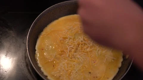 Making eggs, cooking eggs, scrambled eggs, breakfast Stock Footage 262183767