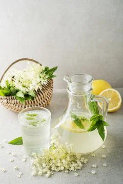 Making Elder flower drinks with lemon and mint leaves Stock Photos