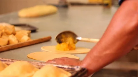 Making empanadas with pineapple jam Stock Footage 130084260