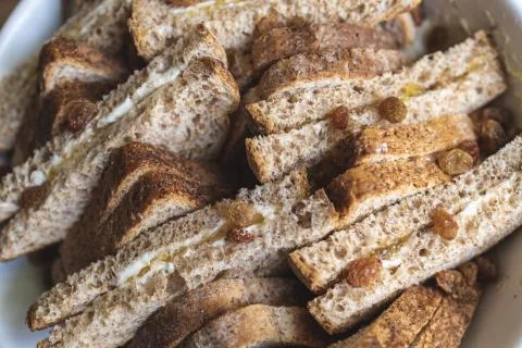 The making of an english style bread pudding Stock Photos