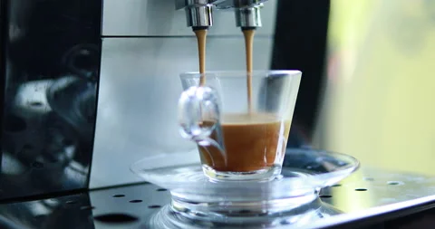 Making Espresso coffee drink Small Coffee Mug in a Coffee Shop Stock Footage 141635042