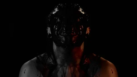 Making faces, covered in blood Stock Footage 99072196