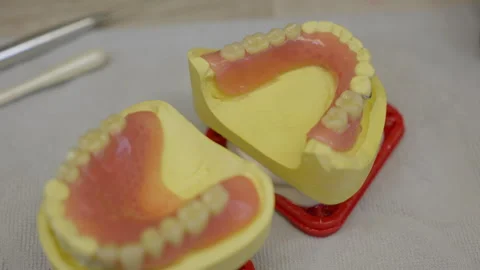 Making the fake teeth prosthetic models ... | Stock Video | Pond5