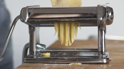 Making fettucine with machine,close up Stock Footage 74721740