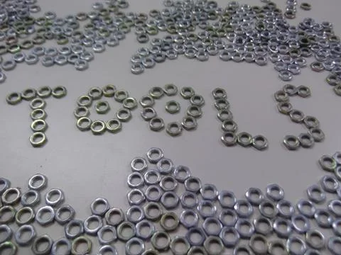 Making figures with screws in iron Stock Photos