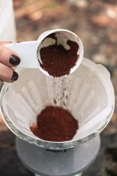 Making filter coffee. Coffee in the car. Autumn forest. Stock Photos