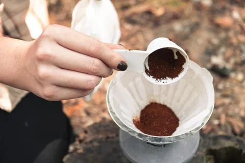 Making filter coffee. Coffee in the car. Autumn forest. Stock Photos