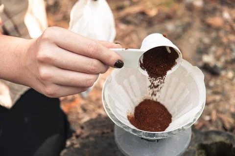 Making filter coffee. Coffee in the car. Autumn forest. Stock Photos