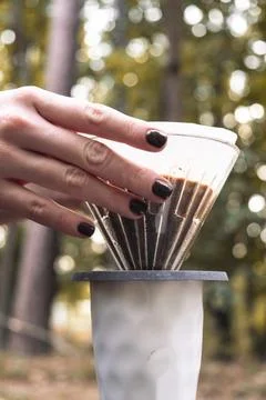 Making filter coffee. Coffee in the car. Autumn forest. Stock Photos
