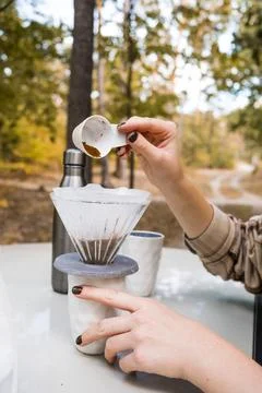 Making filter coffee. Coffee in the car. Autumn forest. Stock Photos