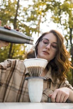 Making filter coffee. Coffee in the car. Autumn forest. Stock Photos