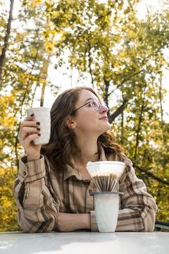 Making filter coffee. Coffee in the car. Autumn forest. Stock Photos