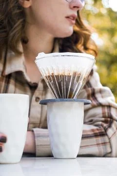 Making filter coffee. Coffee in the car. Autumn forest. Stock Photos