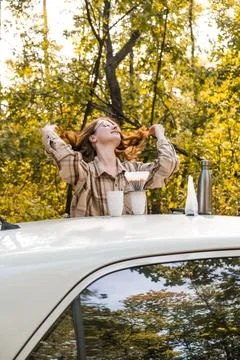 Making filter coffee. Coffee in the car. Autumn forest. Stock Photos