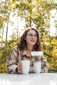 Making filter coffee. Coffee in the car. Autumn forest. Stock Photos