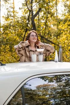 Making filter coffee. Coffee in the car. Autumn forest. Stock Photos