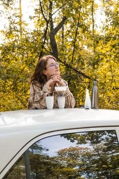 Making filter coffee. Coffee in the car. Autumn forest. Stock Photos