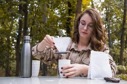 Making filter coffee. To go. Coffee in the car. Stock Photos