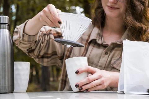 Making filter coffee. To go. Coffee in the car. Stock Photos