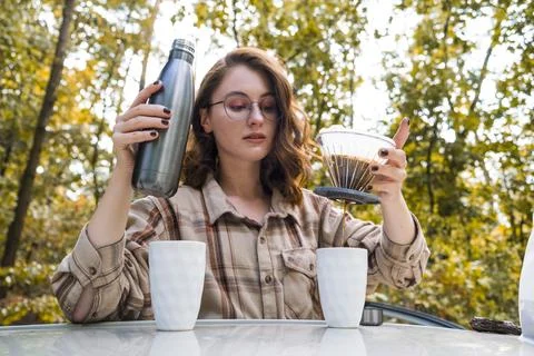 Making filter coffee. To go. Coffee in the car. Stock Photos