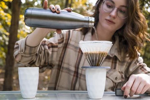 Making filter coffee. To go. Coffee in the car. Stock Photos
