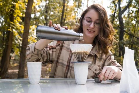 Making filter coffee. To go. Coffee in the car. Stock Photos