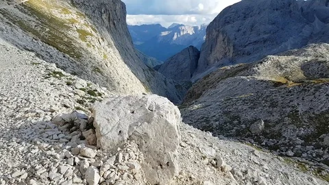Making the final step of a hike in the astonishingly beautiful Dolomites. Stock Footage 97718056