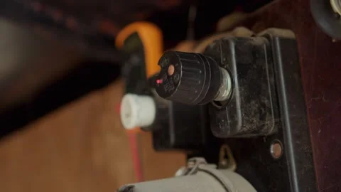 Making Fine Adjustments to the Control Knob on Equipment to Achieve Optimal Stock Footage 308740113