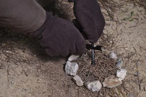 Making fire with a Fire Starter Stock Photos