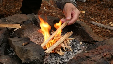 Making a fire at the fireplace Stock Footage 98365457