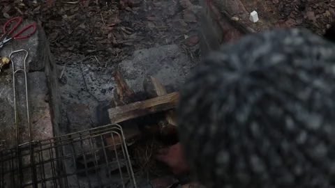 Making a fire Stock Footage 199210420