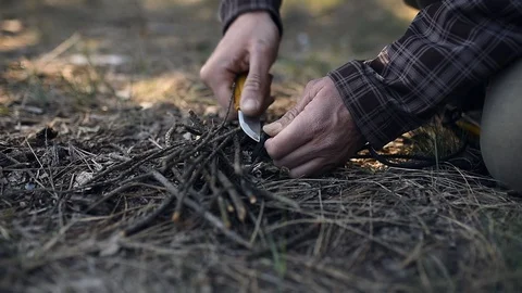 Making fire using flint Stock-Footage 127648544
