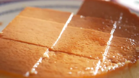 Making flan at home with simple steps and basic ingredients Video stock 323338674