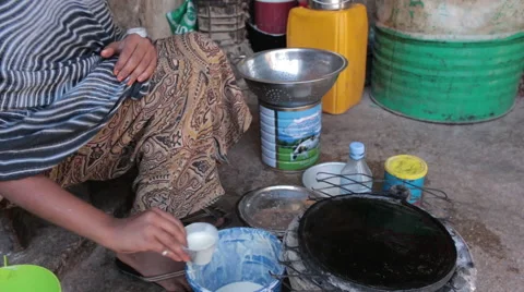Making Flat Bread in Somalia Stock Footage 63478921