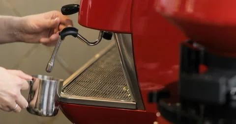 Making Fresh coffee. Barista makes coffee in coffee bar. Coffee machine making Stock Footage 88817952