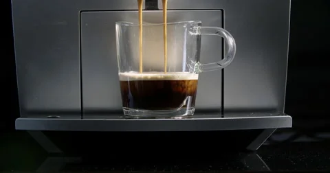 Making Fresh Coffee from a Coffee Espresso Machine Video stock 63844018