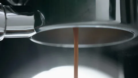 Making Fresh Coffee from a Coffee Espresso Machine 動画素材 251850276