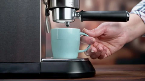 Making Fresh Coffee from a Coffee Espresso Machine Stock Footage 251862897