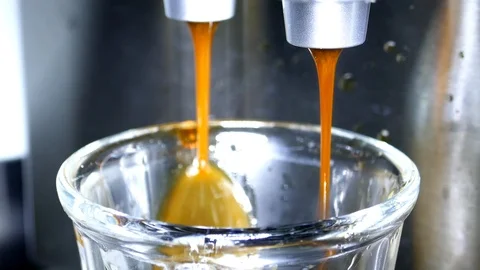 Making Fresh coffee going out from a coffee espresso machine Stock Footage 98533500
