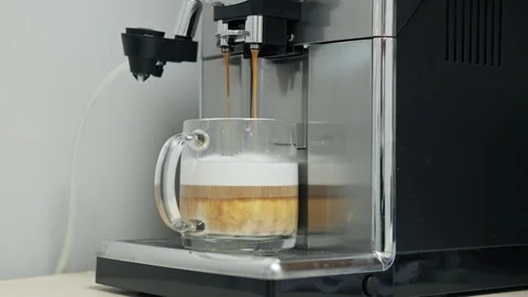 Making fresh coffee going out from coffee espresso machine Stock Footage 115907795