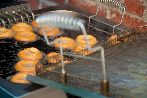 Making fresh donuts outside Stock Photos